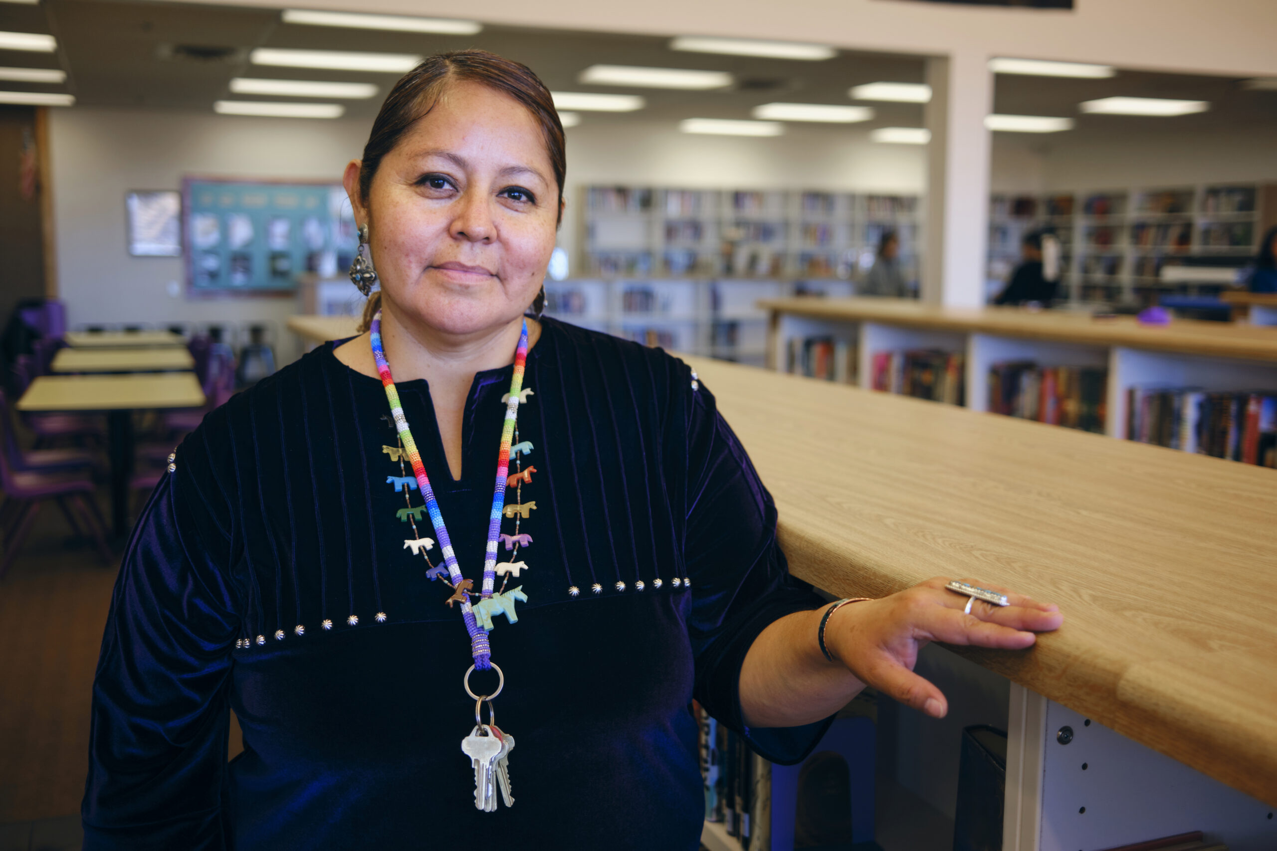 High School Teacher in a Library